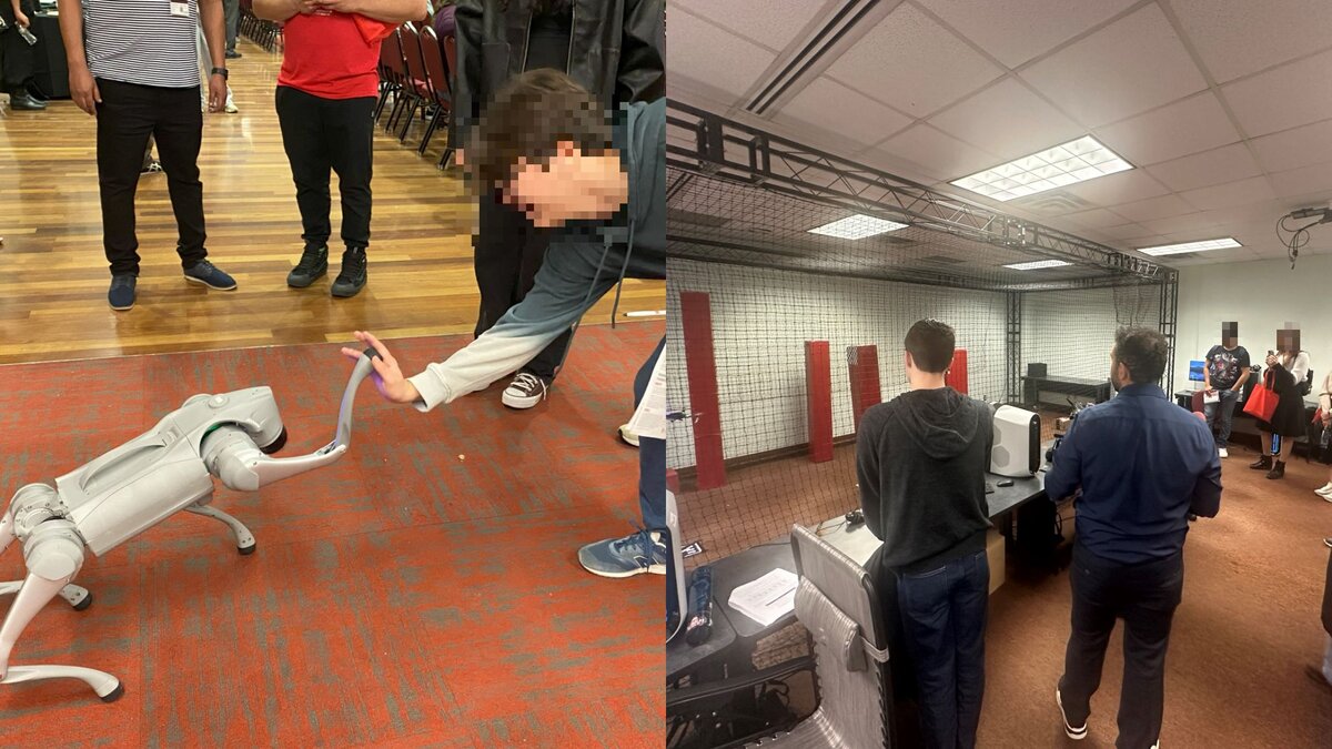 New students gathered around the lab's quadruped robot during a demonstration.
