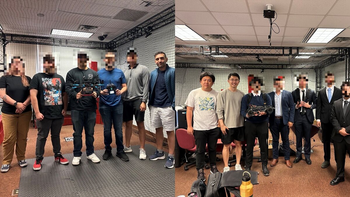 Undergraduate capstone team members standing in the lab with their drones.