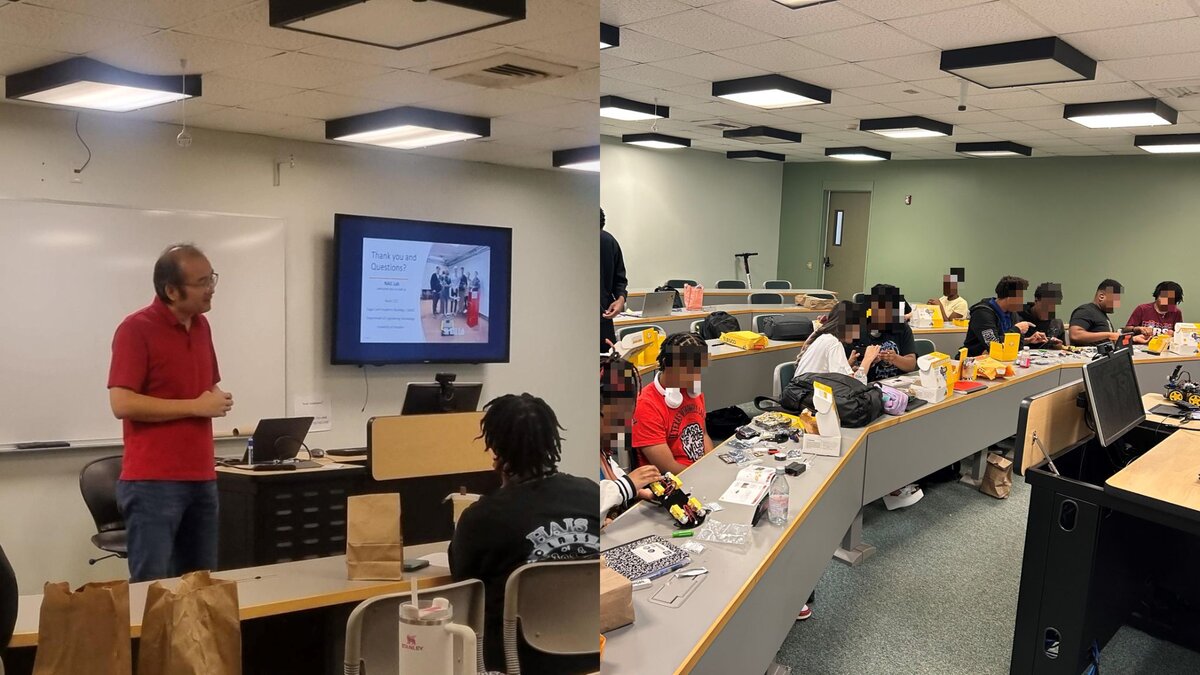 High school students working on laptops during a summer camp session.